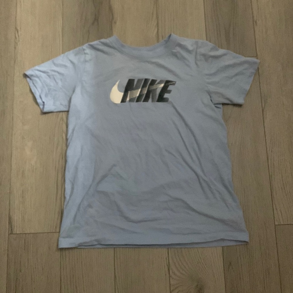 Teal Nike tee branded for kids